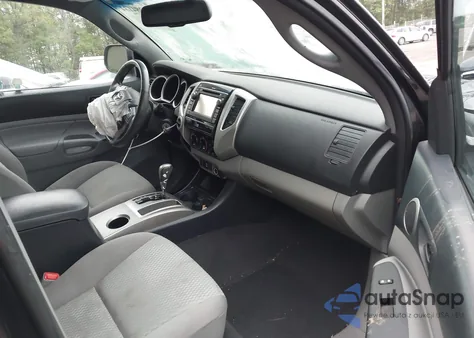 2013 Toyota Tacoma Access Cab z USA, uszkodzony, nr VIN 5TFUX4EN8DX021099